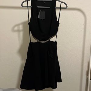 Cut out black dress with silver detailing